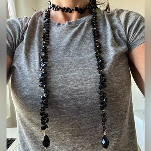 Black bead necklace can style it different ways.